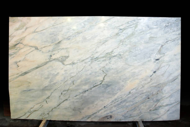 A large slab of natural stone of a gray-pink color is called Grey Portugalo.